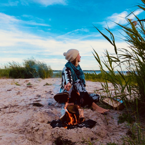 Woman sitting on the beach